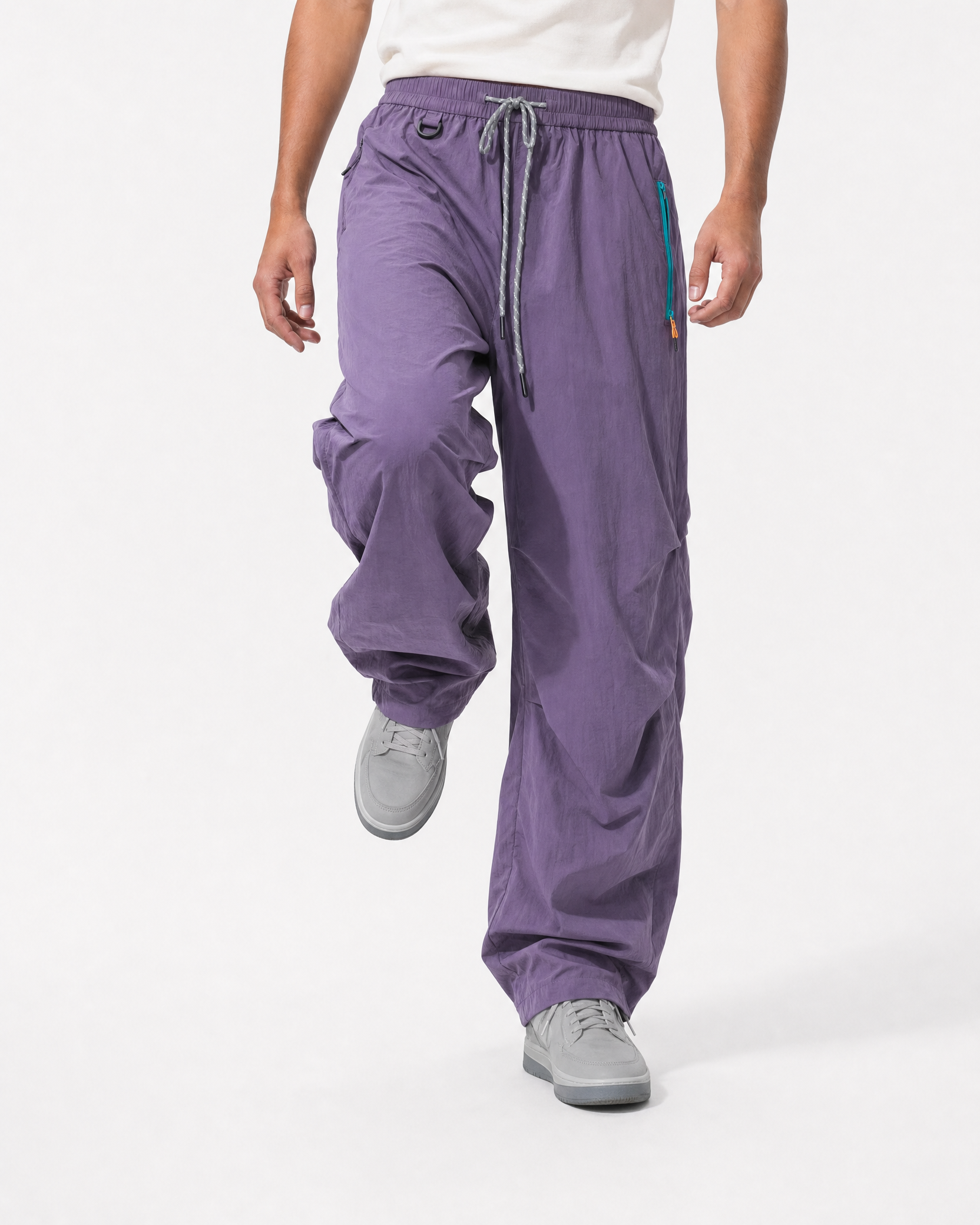 Women's water-repellent hiking trousers in purple, knee lifted motion # Colour_Purple