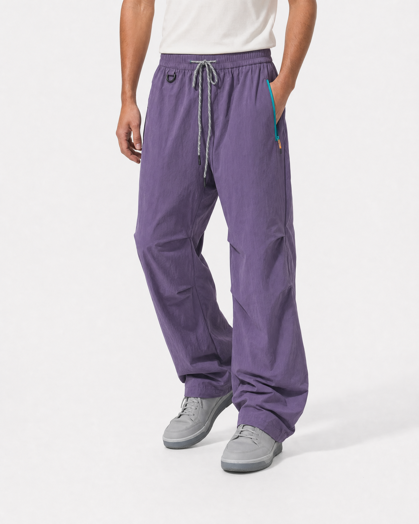 Women's water-repellent hiking trousers in purple, relaxed hand in pocket # Colour_Purple