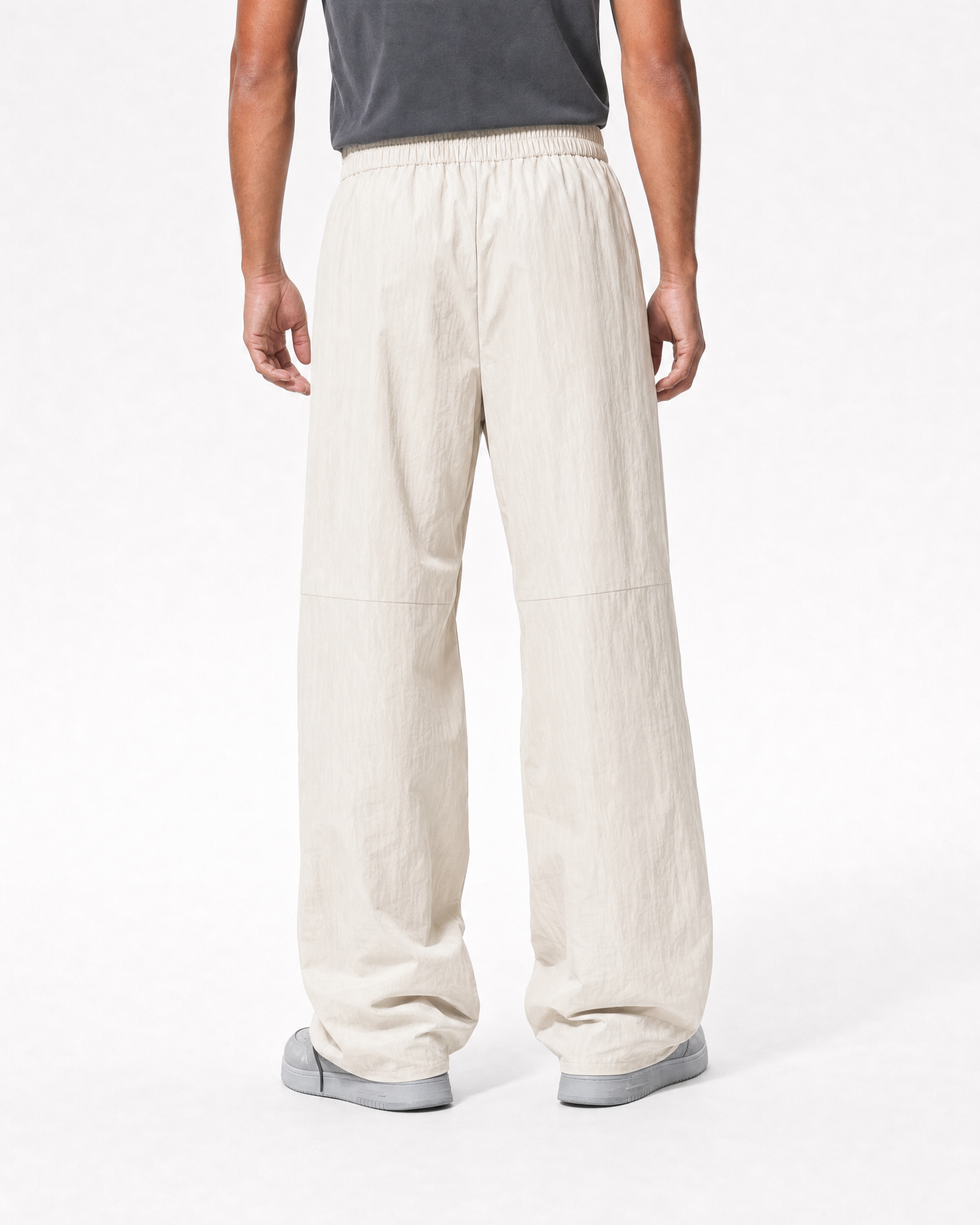 Women's water-repellent hiking trousers in khaki, back view # Colour_Khaki