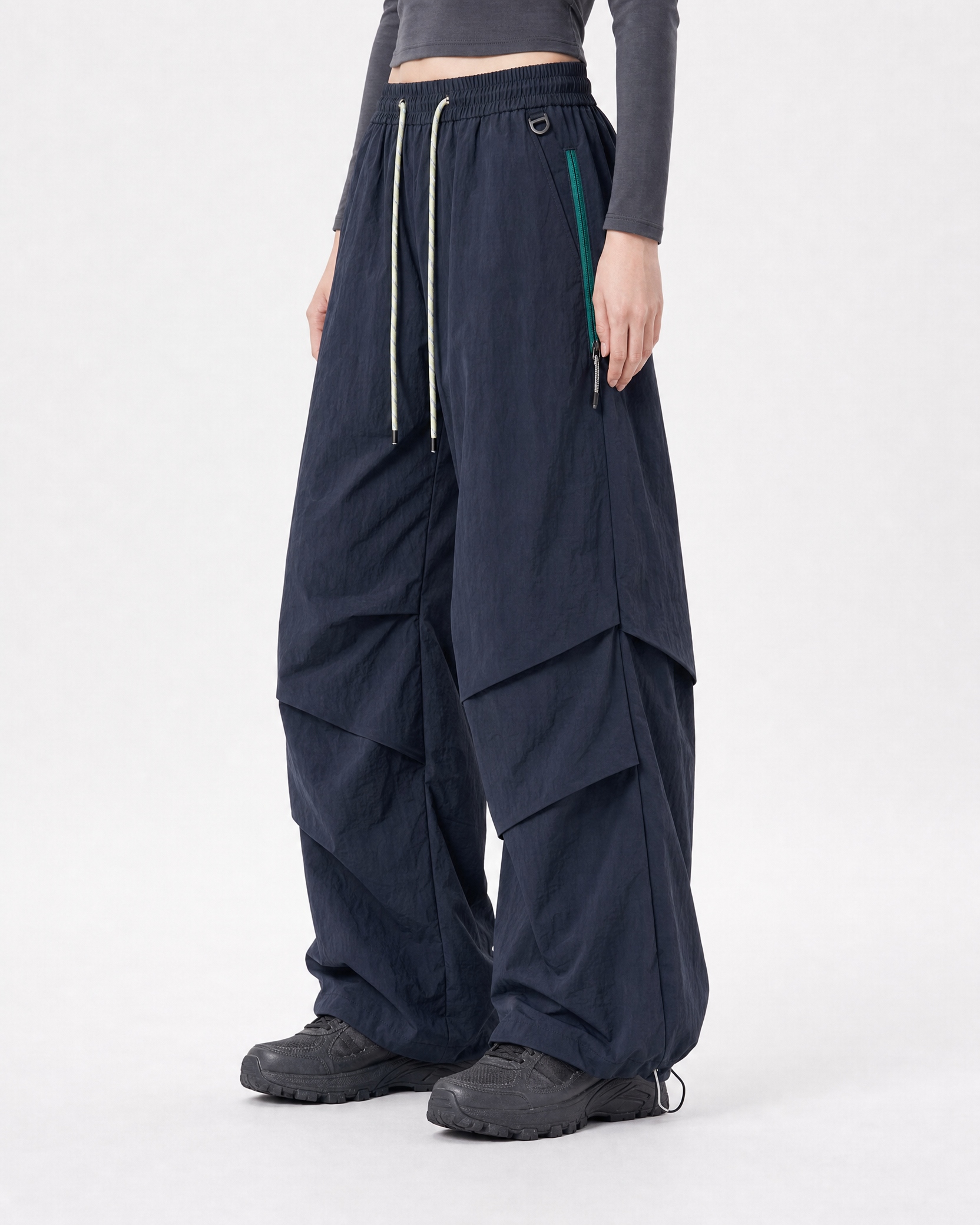 Women's water-repellent hiking trousers in navy, three-quarter side # Colour_Navy