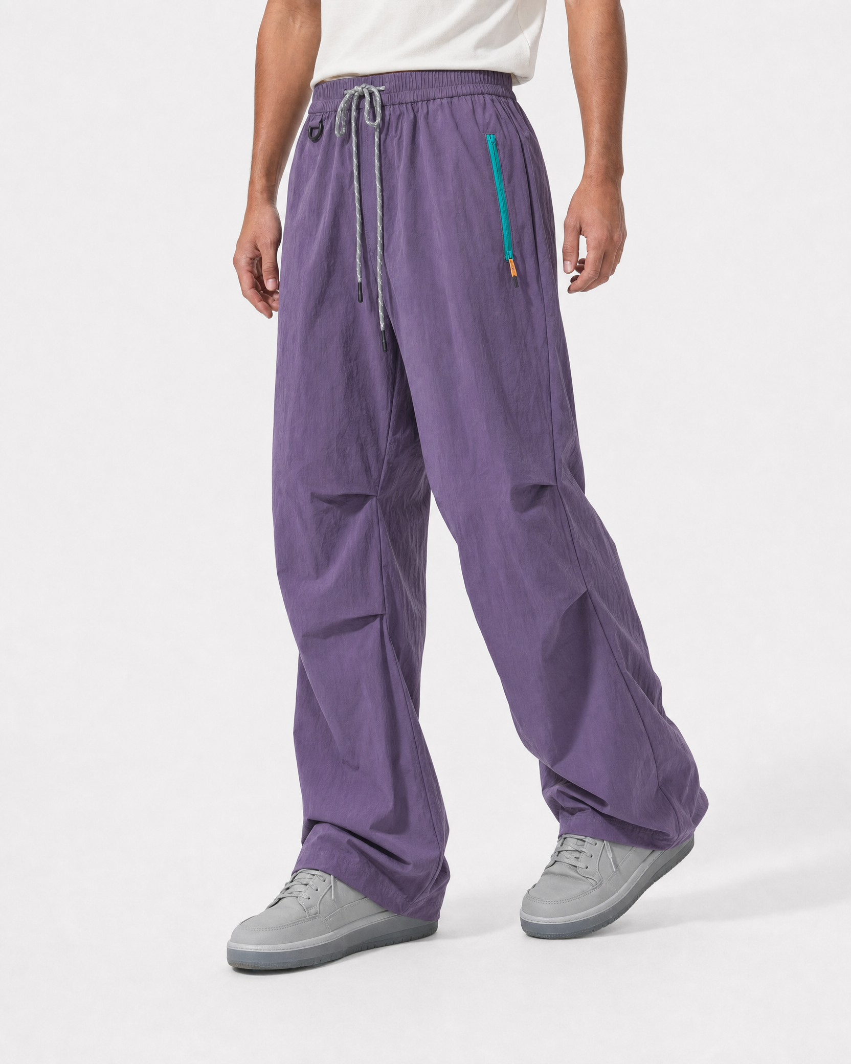 Women's water-repellent hiking trousers in purple, three-quarter side drape # Colour_Purple