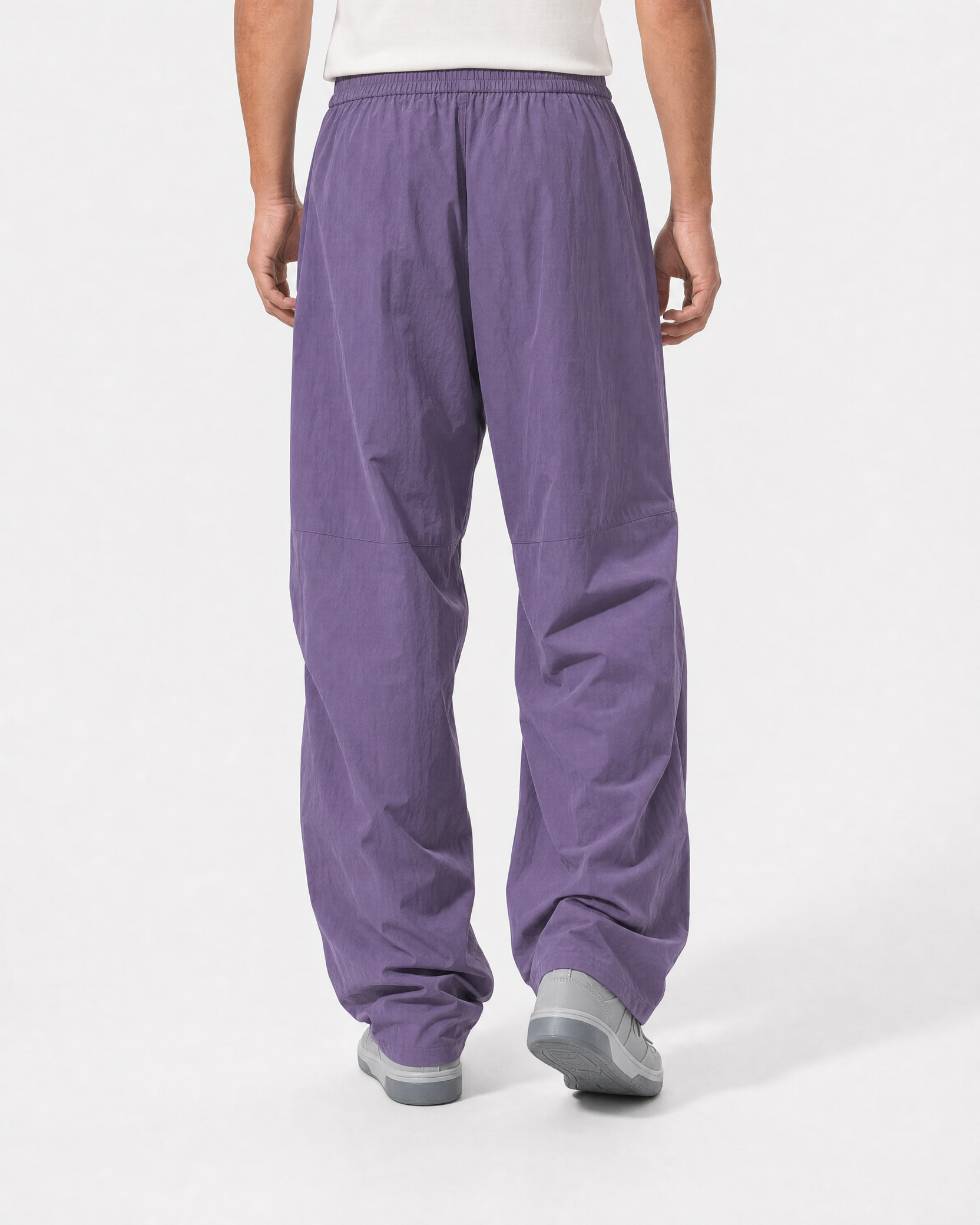 Women's water-repellent hiking trousers in purple, back view # Colour_Purple