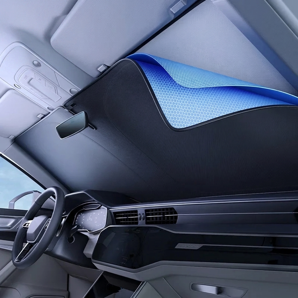 Car windscreen sun shade fully covering the front windscreen, interior view