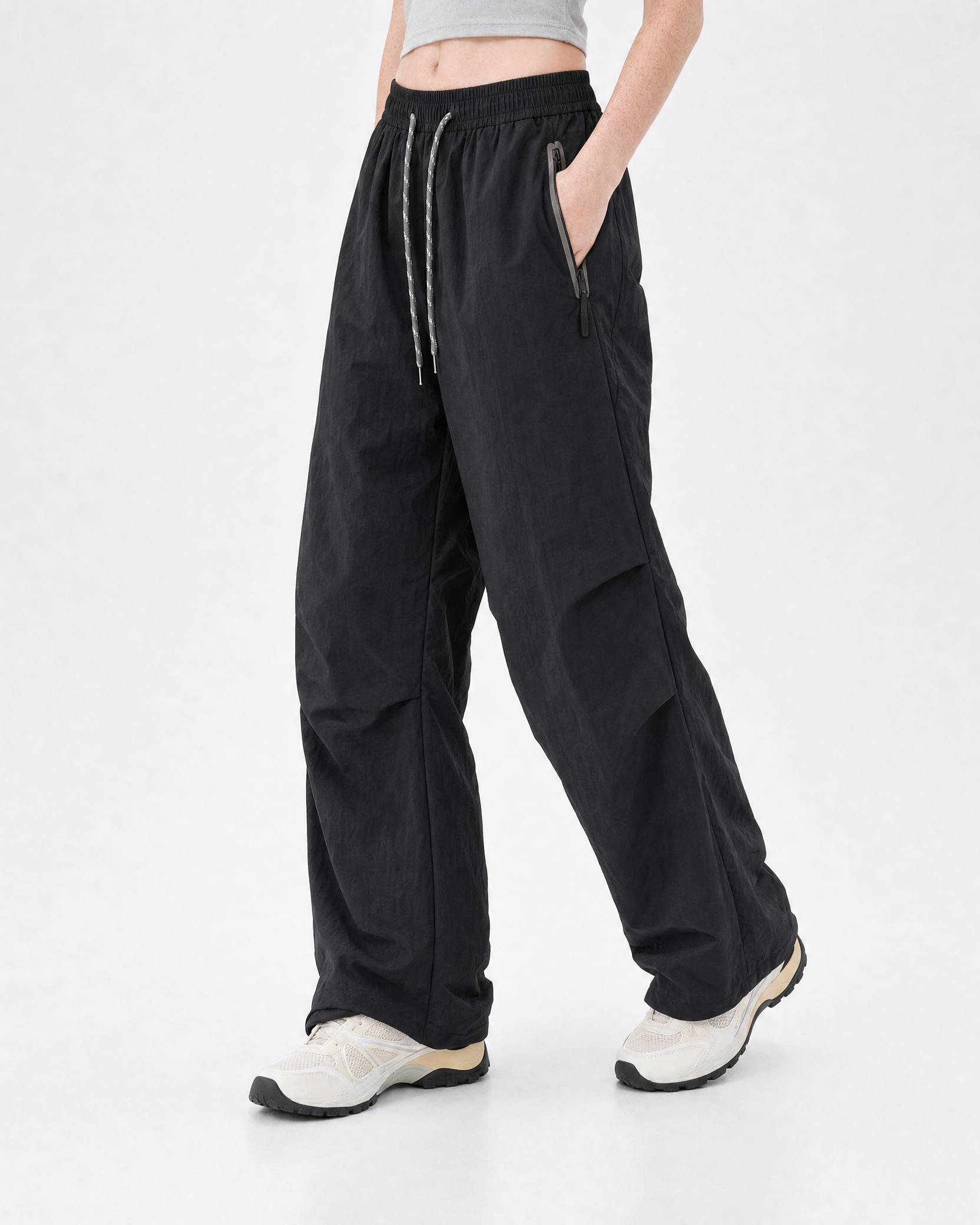 Women's water-repellent hiking trousers in black, three-quarter view # Colour_Black