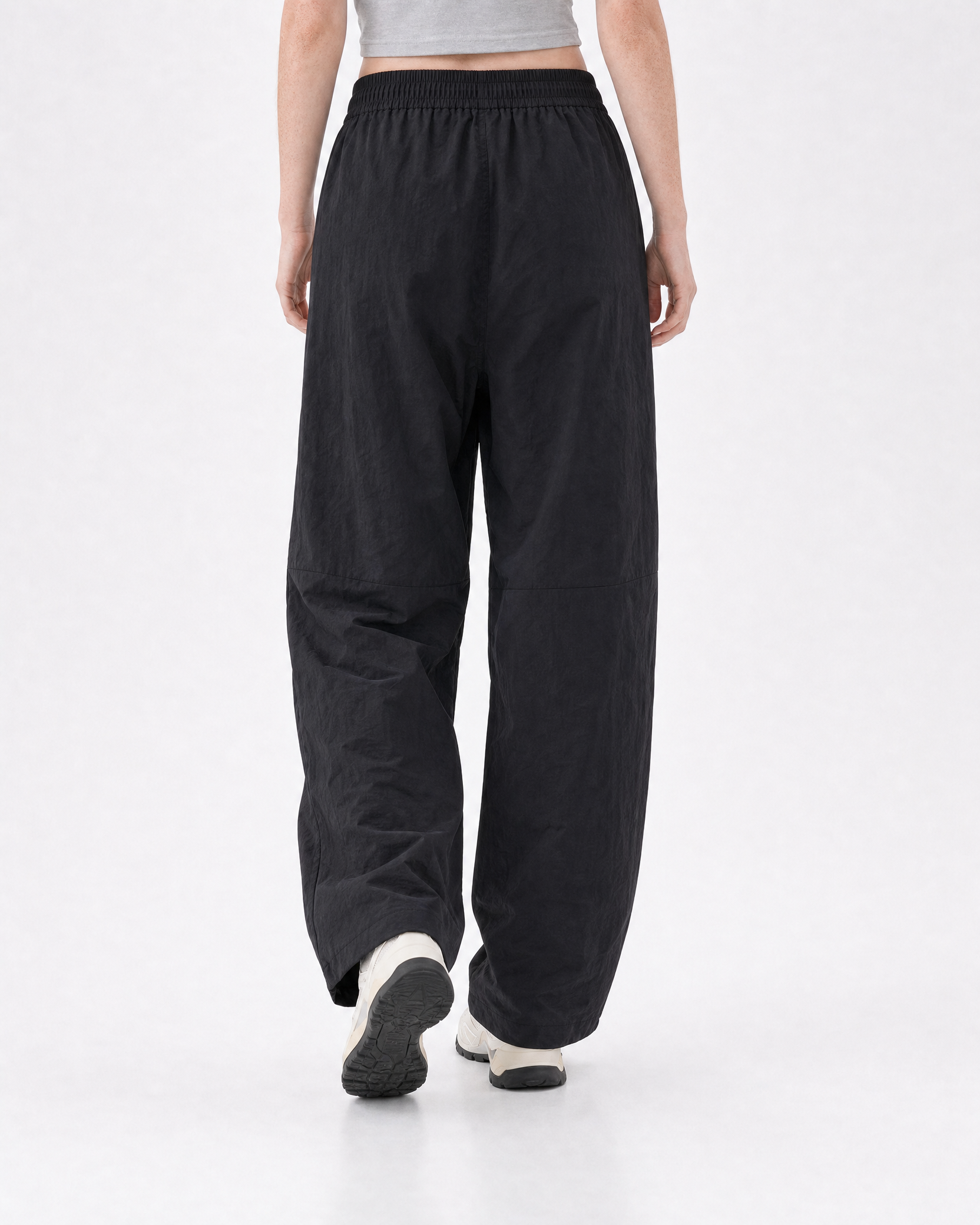 Women's water-repellent hiking trousers in black, back view # Colour_Black